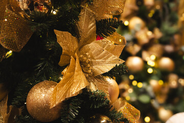 Close-Up of Gold Christmas Ornaments on Tree