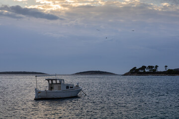 Serene Coastal Scene With Boats, Calm Water, and Historic Village Shoreline at Dusk, Maslinica, Croatia