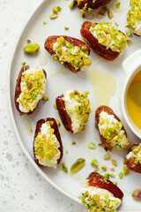 Honey Pistachio Ricotta stuffed Dates.selective focus