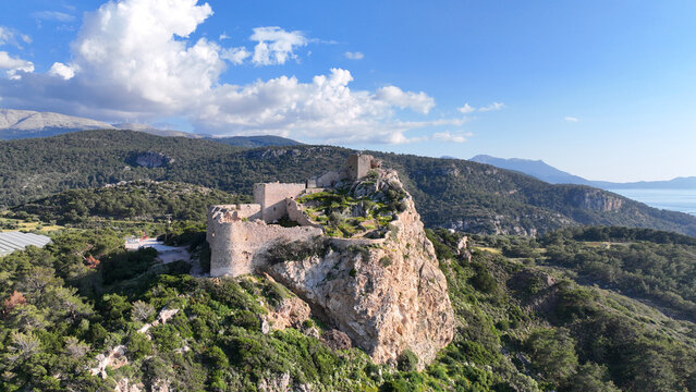 Aerial drone photo of iconic castle of Kritinia built on a hilltop by Knights of Saint John, with magnificent views to Aegean Sea, Rhodes island, Dodecanese, Greece