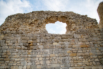 Fortress wall made of stone from the ancient city on a clear sunny day, Chersonesos. Sights of Russia. Architecture of World tourism. © Victor1153