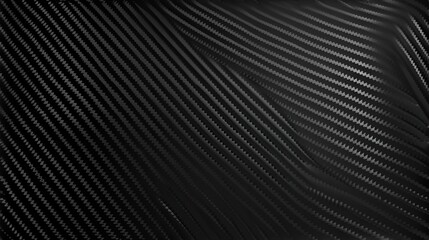 Black carbon fiber texture with a diagonal weave pattern. Modern dark composite material background. Abstract high-tech luxury surface for automotive design