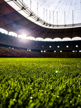 Massive Soccer Stadium Filled. Wide view of empty stadium. Green grass on a sport Arena. Empty Football Soccer Stadium Tribune. National arena with empty seats. Sport event on National Arena. 