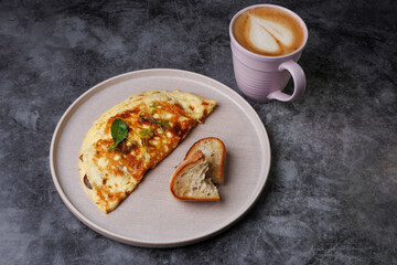 Delicious Cheese Omelette On Plate With Toast And Morning Coffee Scene