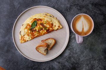 Delicious Cheese Omelette On Plate With Toast And Morning Coffee Scene