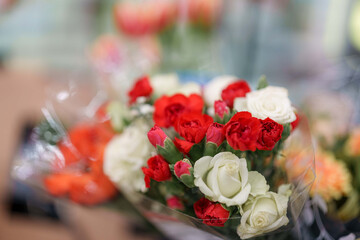 Romance in red and white a beautiful bouquet of roses and carnations