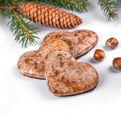 gingerbread with christmas tree sprig and pine cones