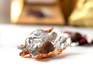 delicious chocolate pralines wrapped in foil
