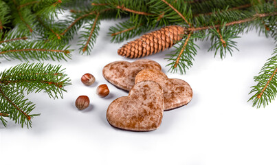 gingerbread with christmas tree sprig and pine cones