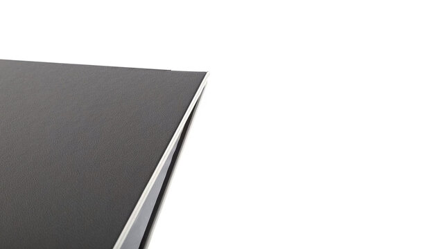 Black binder on white background, showcasing clean lines and a minimalist design ideal for writing or sketching