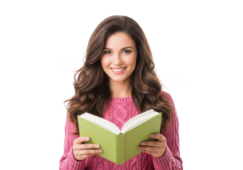 Smiling young woman with long brown hair wearing a pink sweater holds open an open green book against a black background