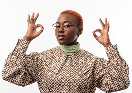 Confident african american woman with short red hair showing ok sign isolated on white background - Powered by Adobe