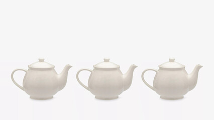 Three white teapots arranged in a row against a blank background showcasing simple, clean design.