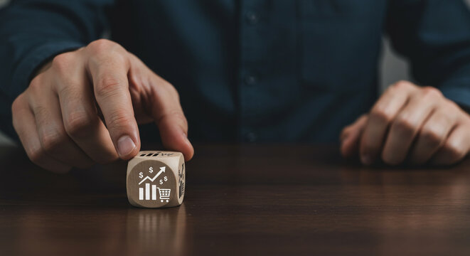 Drive Business Growth and Sales with this Unique Concept Presenting a Dice with Financial Growth Symbols for Strategy and Planning Success Today