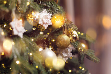 Banner New Year background, Festive christmas tree with glittering ornaments and warm lighting ambiance