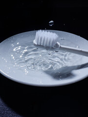 white toothbrush in the water 