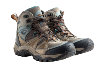 Pair of hiking boots, light beige and brown tones, featuring rugged outsole and lacing system