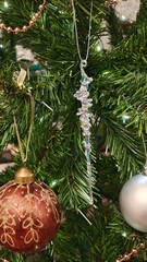 Christmas toys are balls, icles, garlands at the christmas tree