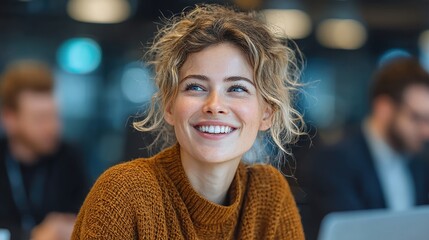 Cheerful businesswoman smiles during meeting with colleagues in office setting, discussing strategy and market trends, during the day