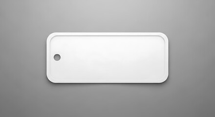 Blank white rectangular dog tag with rounded corners on a gray background