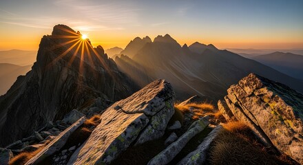 Dramatic sunburst over stunning mountain peaks at sunrise, a vista of adventure, freedom, and breathtaking natural beauty inspiring exploration