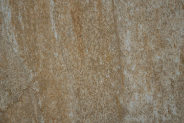 natural beige and brown stone texture surface background with rough veins and abstract pattern concept of masonry, tile design, geology
