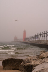 Breakwater on a foogy morning.  South Pierhead, Grand Haven, Michigan, USA.
