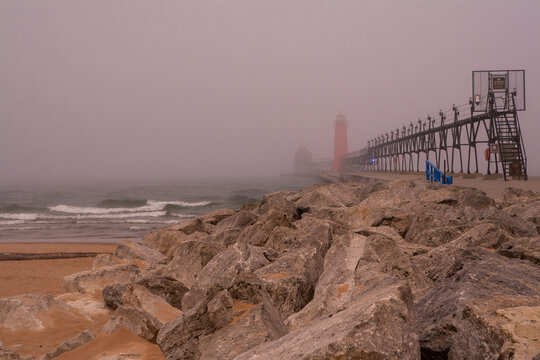Breakwater on a foogy morning.  South Pierhead, Grand Haven, Michigan, USA.