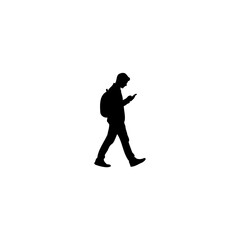 Man walking focused on his phone, a modern lifestyle concept perfect for technology and communication themes
