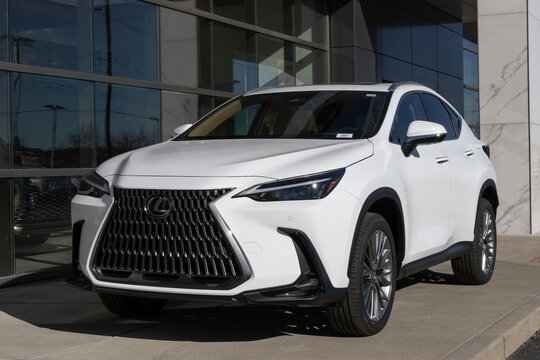 Lexus NX 350h AWD Luxury Crossover at a dealership. Lexus offers the NX350h with a 2.5L 4-Cylinder hybrid engine. MY:2026