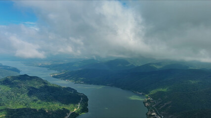 Aerial view on Danube river and mountains under clouds