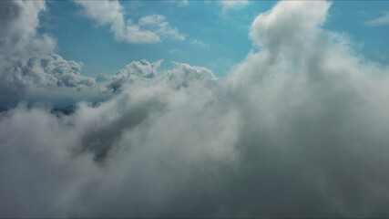 Obraz premium Clouds and blue sky, flying in clouds