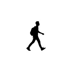 Silhouette of adventurous young man with backpack walking forward with purpose and drive, isolated