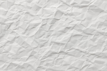 Obraz premium Crumpled white paper with natural folds and creases, realistic texture style, on a neutral background. Concept of imperfection, creativity, and material design