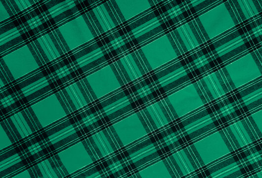 texture of green black white diagonal checkered fabric pattern background. traditional tablecloth checkered as backdrop. top view. Merry christmas happy New year holiday Holiday event - Powered by Adobe