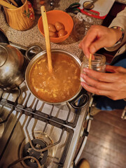 Step-by-step preparation of Peruvian Creole Soup made with beef, noodles, egg, and milk