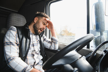 Truck driver suffering from fatigue and stress while driving