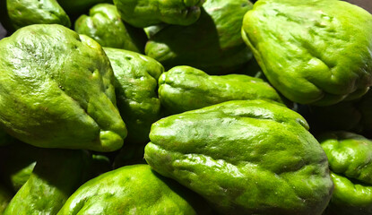 pile of fresh green chayote, healthy vegetables