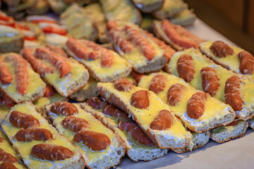 Baguette sandwiches with sausages at the Christmas Market in Strasbourg, France