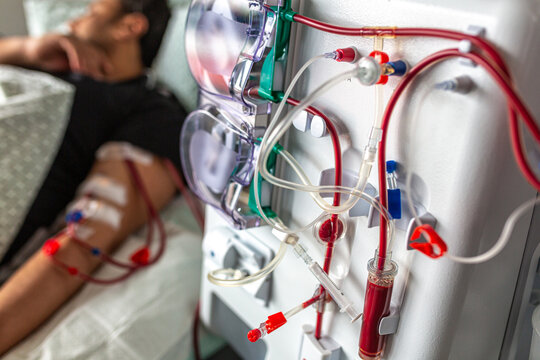 Germany, Bavaria, Munich, Portrait photograph of a man in the dialysis unit of a hospital