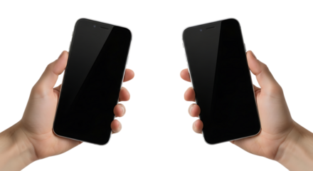 Two hands holding modern smartphones, with blank black screens isolated on a white or transparent background, cutout, PNG