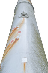 massive cylindrical metal water pipe extends vertically in a low-angle perspective,  orange rust streaks. The industrial vessel features visible seam rings and a circular access hatch