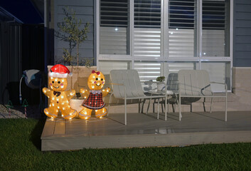 Christmas decoration of two gingerbread male and female statues