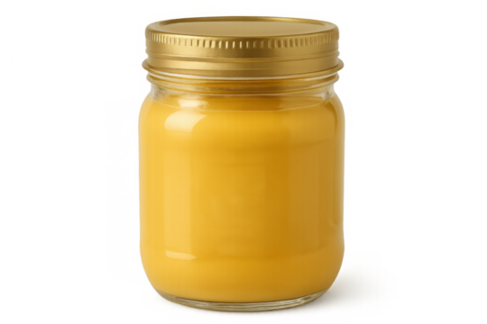 Ghee in glass jar with golden lid on transparent background, cooking ingredient, traditional clarified butter