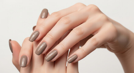 Fototapeta premium A close-up shot of a woman's hands with a perfect manicure