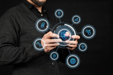 a businessman at the right side of the screen using a smart phone with a digital security concept