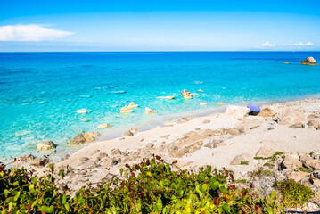 Amazing Gaidaros beach with rocks in turquoise blue sea, Lefkada island, Greece
