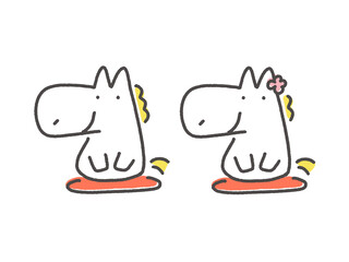 座布団に座り新年の挨拶をする2頭のかわいい白馬夫婦　正月素材