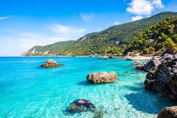 View of rocks in crystal clear turquoise sea on Agios Nikitas beach, Lefkada island, Greece