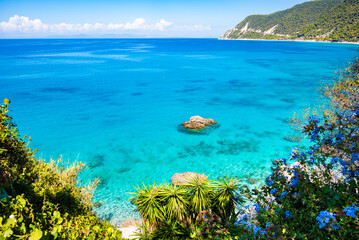 View of rocks in crystal clear turquoise sea on Agios Nikitas beach, Lefkada island, Greece